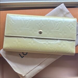 Louis Vuitton Cream Wallet with Monogram Embossed Design
